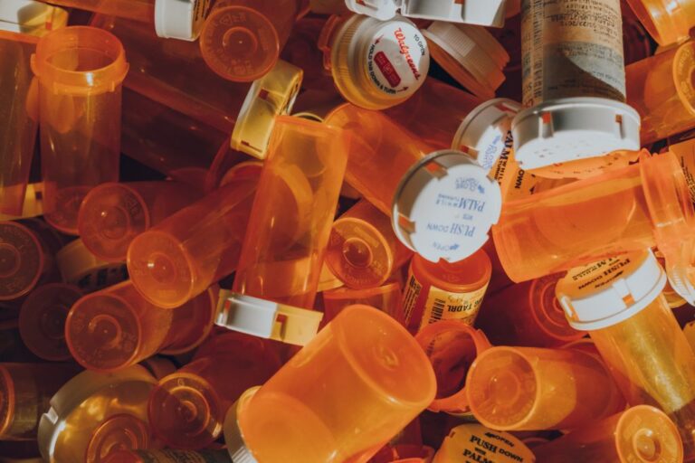 empty orange pill containers
