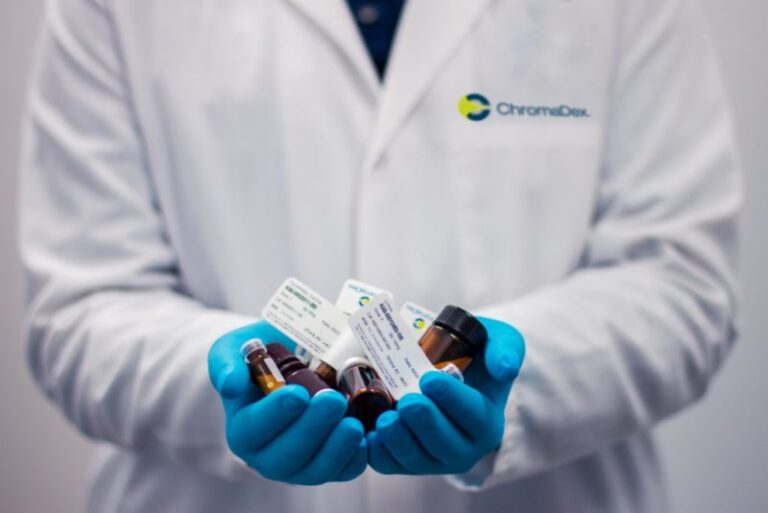 Doctor holding various forms of drugs
