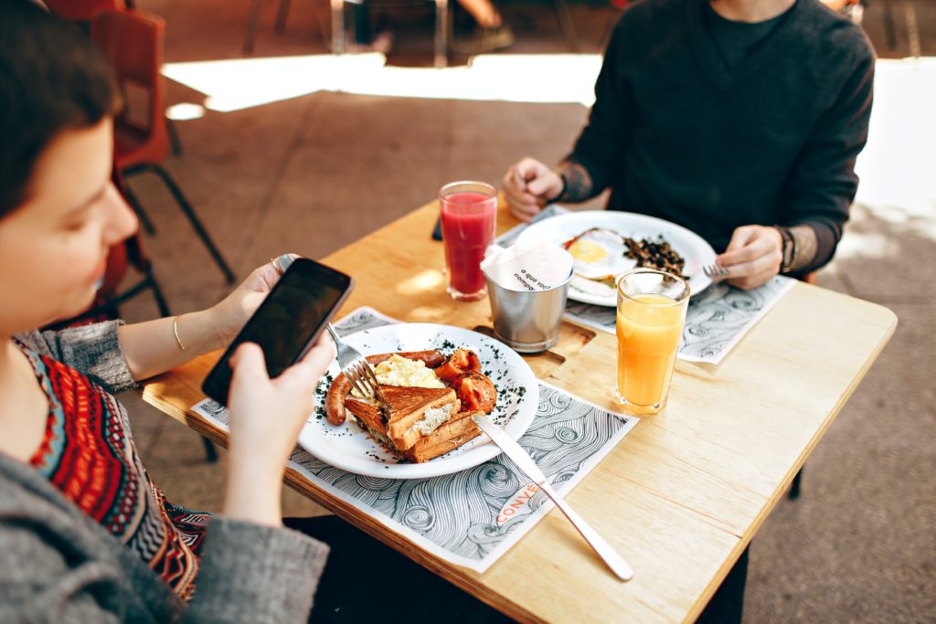 two people eating together